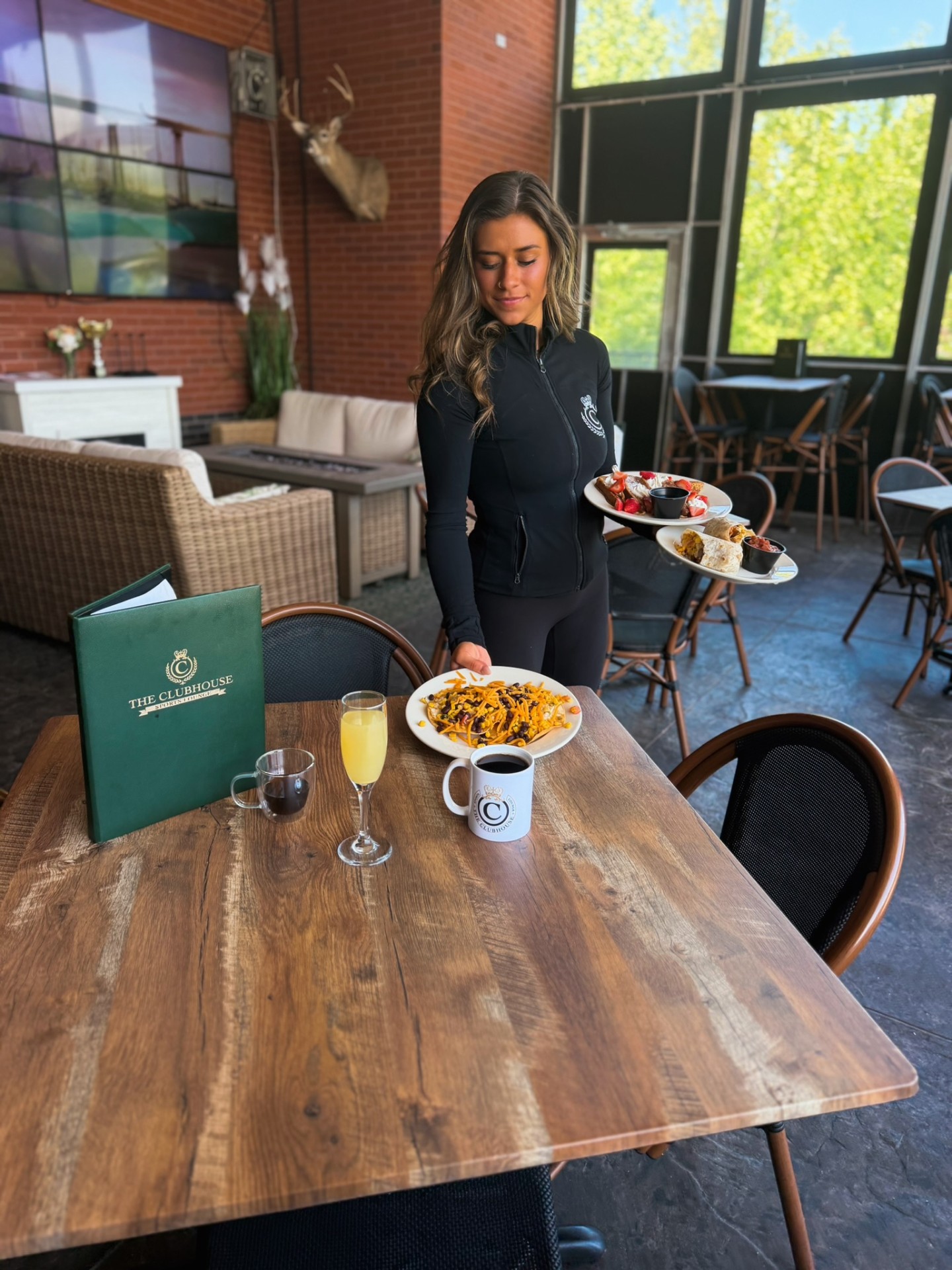 Chicken and waffles brunch plate at Clubhouse Lounge + Kitchen in Edwardsville